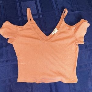Selling this cute pink cropped tank from Bozzolo!! Has off the shoulder sleeves.